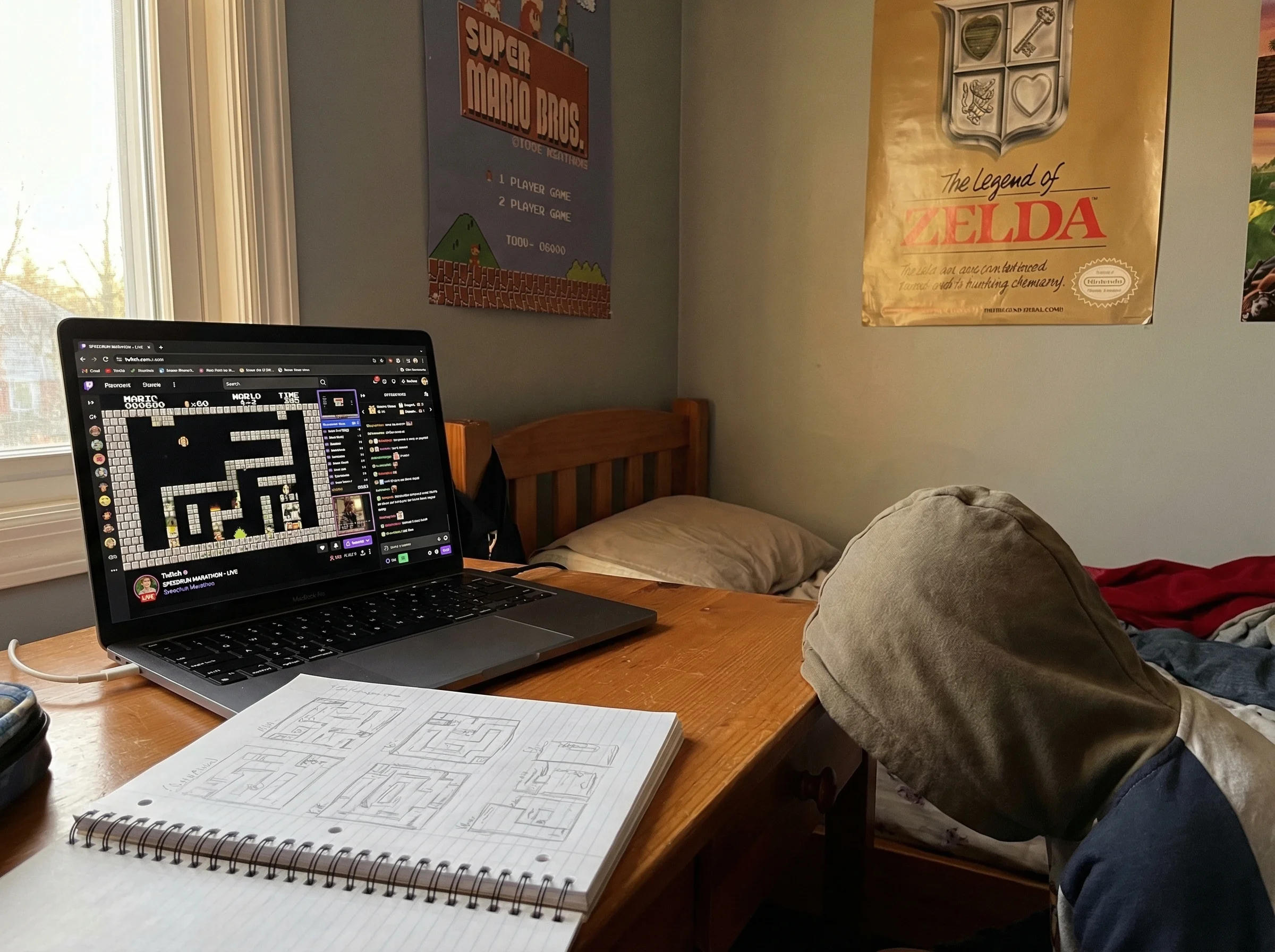 Kid's bedroom with computer showing Twitch stream of speedrunning event, posters of retro games on walls, notebook with hand-